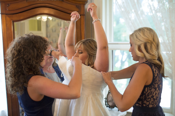 Preparation before the Brosher-Harrington wedding at the Vrooman Mansion Saturday, May 30, 2015, in Bloomington, Ill. (Stephen Haas)